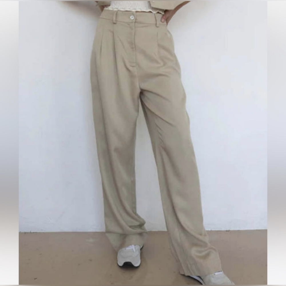 DONNI. Beige High-Waisted Wide-Leg Trousers